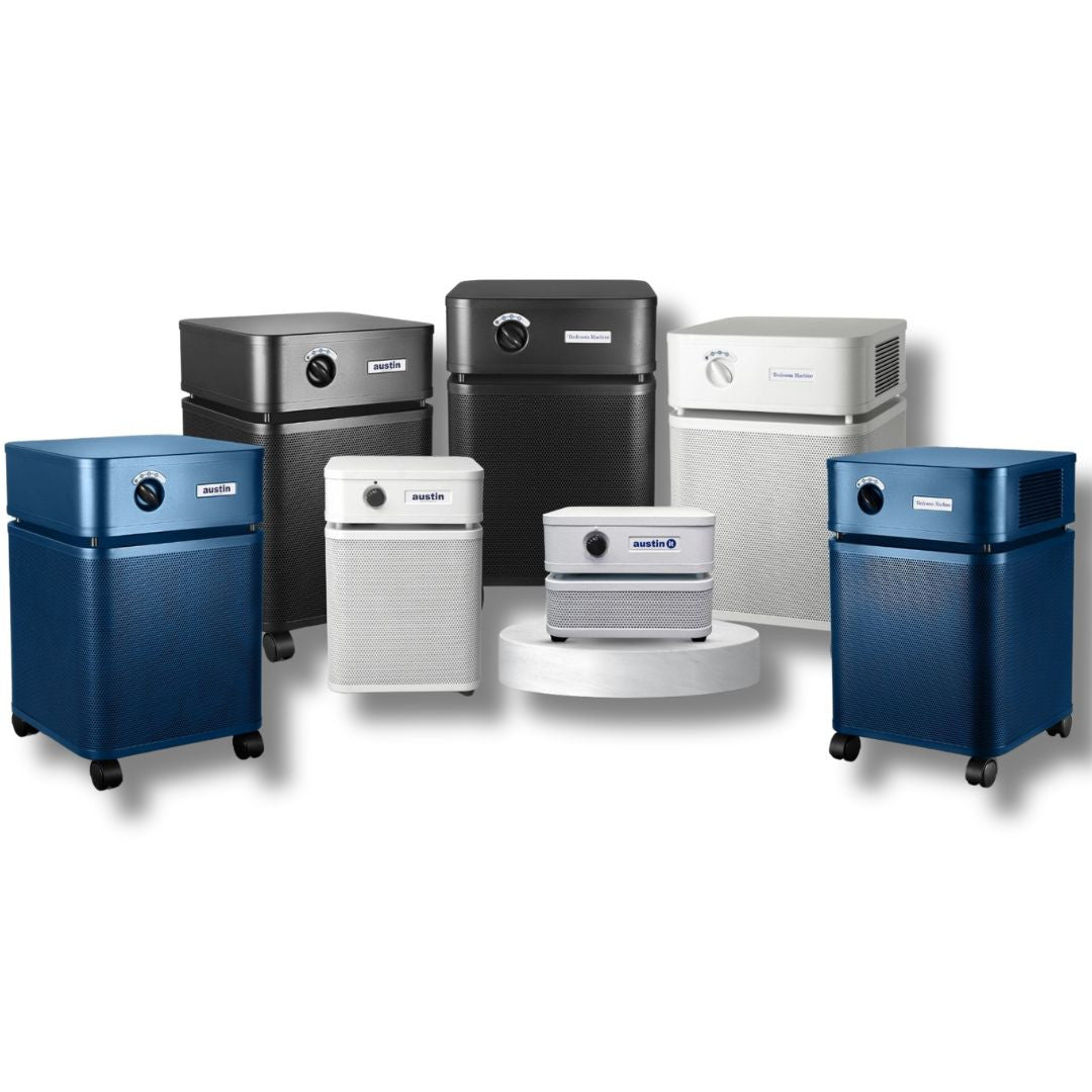 Collection of various Austin Air purifiers on a white background