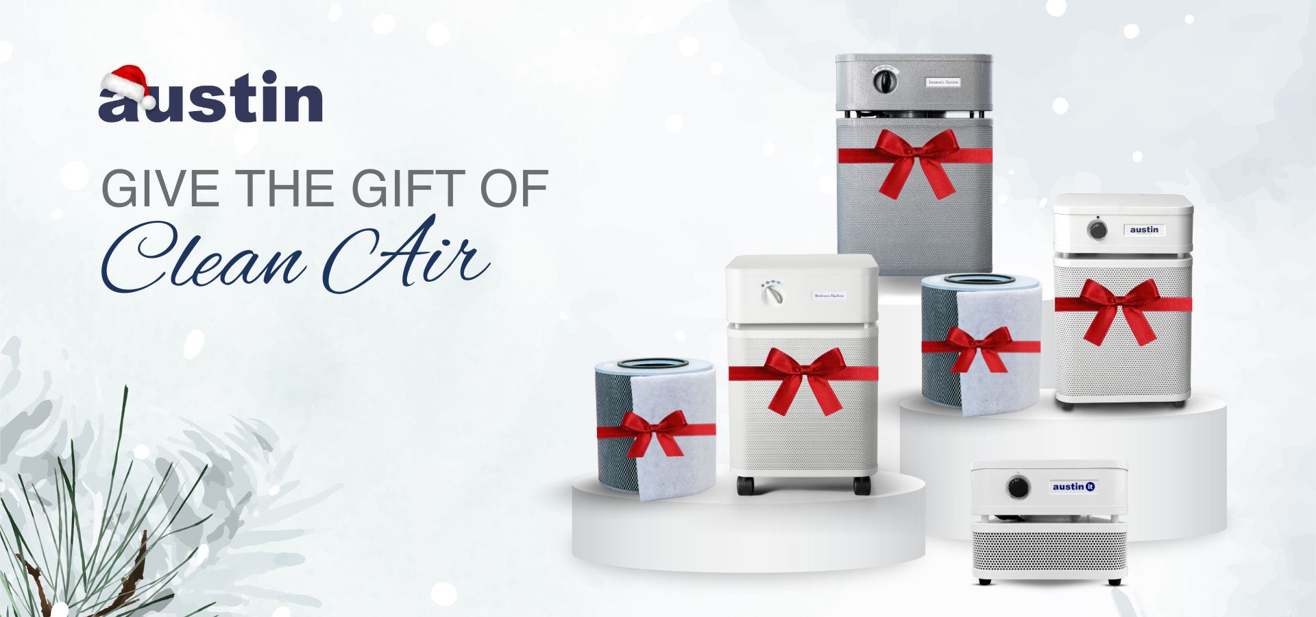 Air purifiers with red ribbons on a white background, featuring the Austin Air brand.