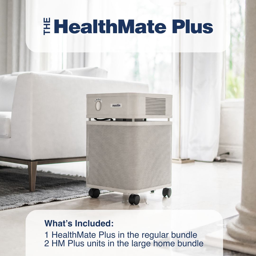 HealthMate Plus air purifier in a room with a couch and curtains