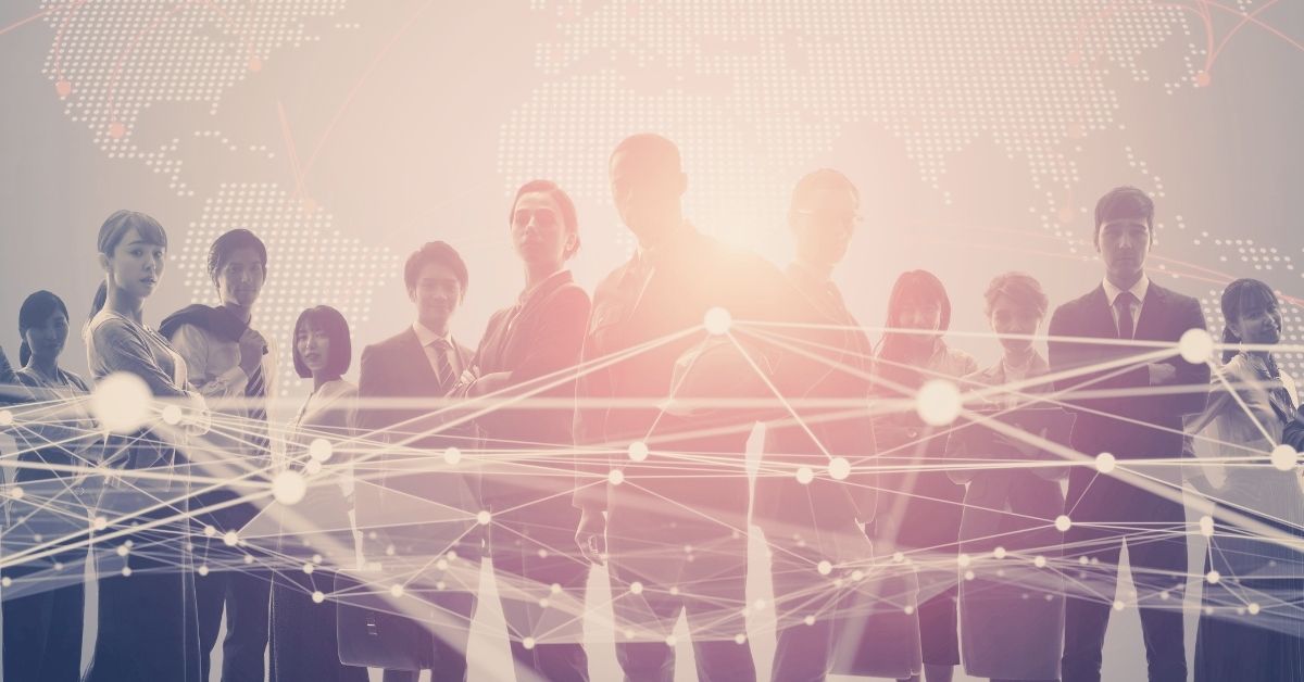 Professional people standing in a line facing camera, with a graphic of a network overlaying