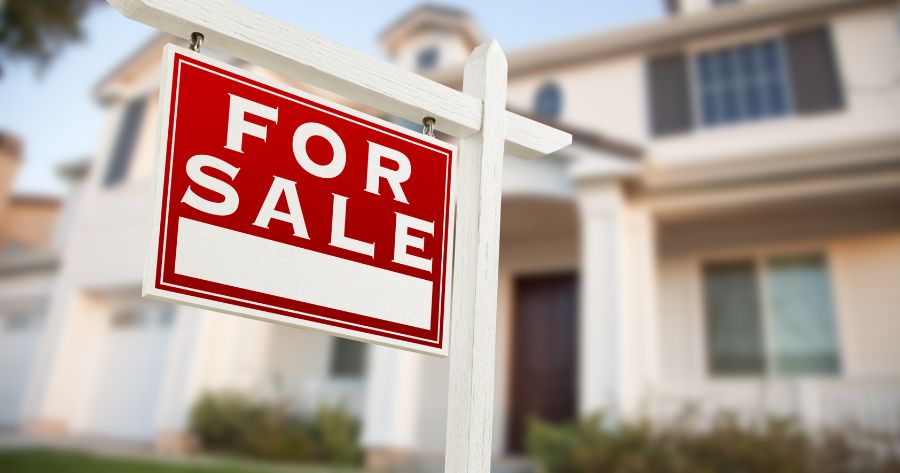 For sale sign outside a house