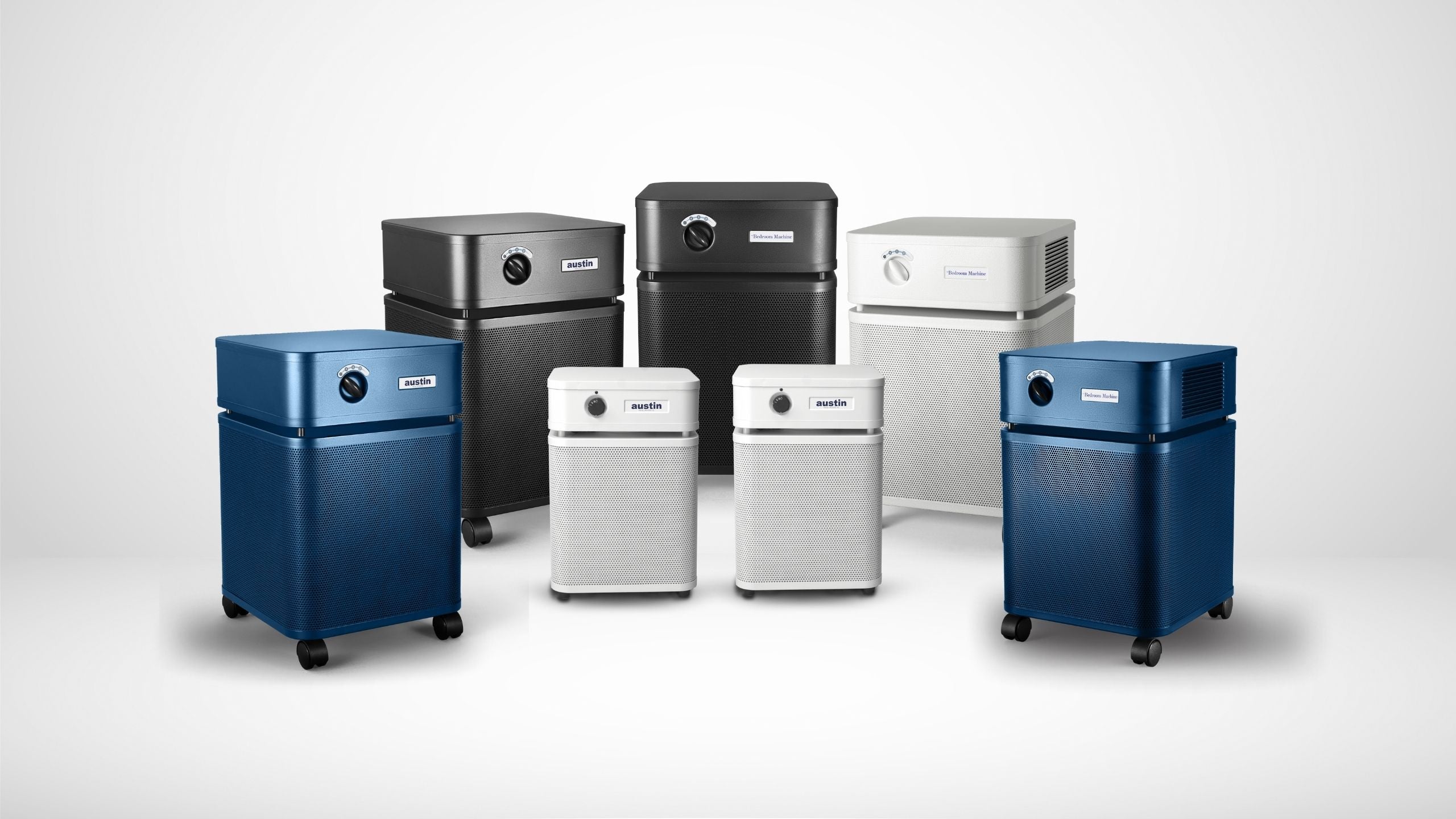 Multiple Austin Air purifiers shown in various home settings as part of a Multi-Room bundle for whole-home air protection.