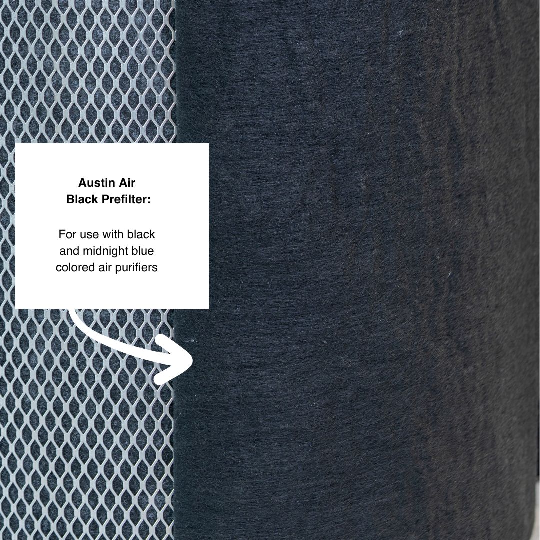 Textured black air filter with a label for Austin Air brand on a dark background