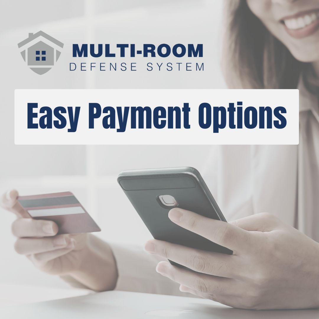 Person holding a smartphone and credit card with 'Multi-Room Defense System' text overlay.