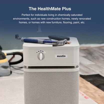 Air purifier labeled 'HealthMate Plus' by Austin on a construction site.