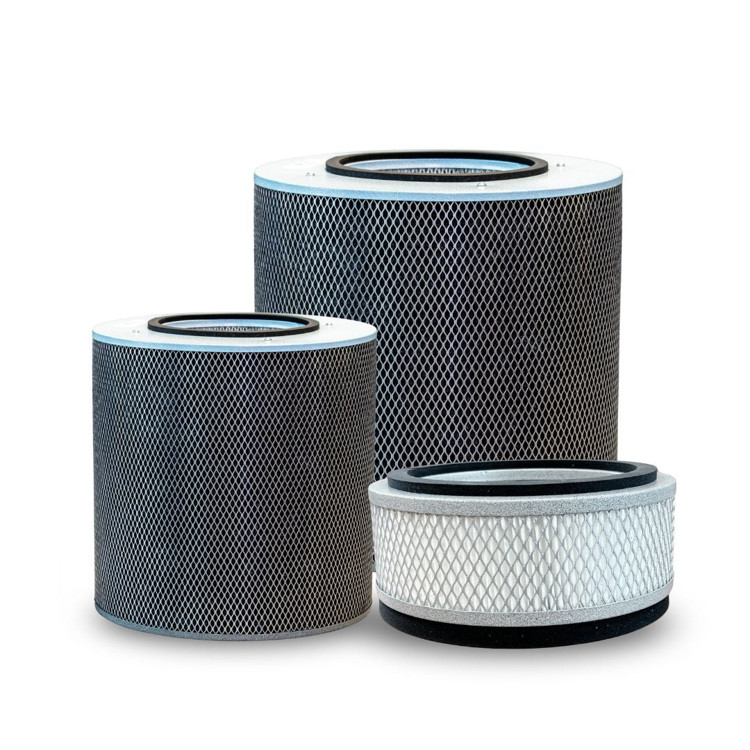 Three air filter cartridges on a white background